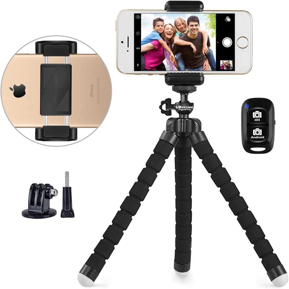 Tripod New In Box with remote clickers.